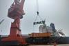 Protranser loading cargo on Breakbulk vessel in Qingdao port