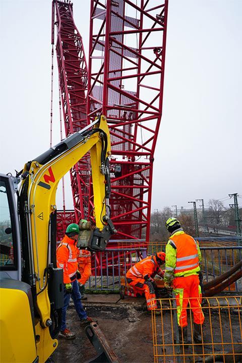 LR 1700-1.0 used to dismantle bridge at Swiss railway station 2