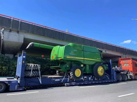 Protranswer delivering a harvester from the USA, via China, to Kazakhstan