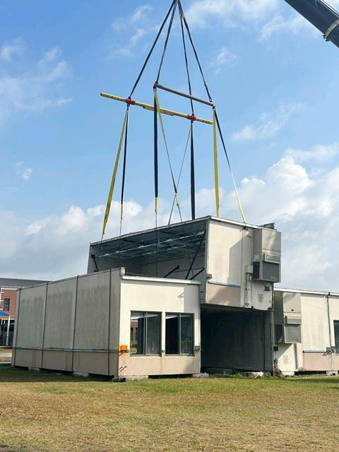 Beyel Brothers Demag 245-ton AC 220-5 lifts classroom into place for Dynamics Group Inc