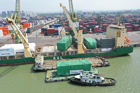 Multipurpose vessel AAL Nanjing being loaded with chimney sections in China for a mining facility. Credit - AAL Shipping