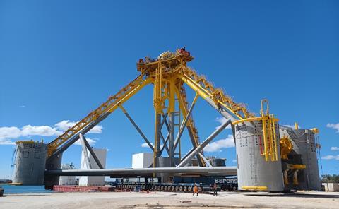 Sarens loading out foundations in Fos-sur-Mer, France.